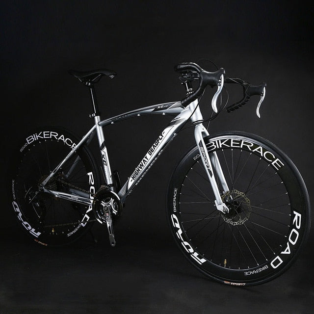 Bicicleta de carretera Bicicleta de engranaje fijo 26 pulgadas 24/27 Cambio de velocidad Doble freno de disco adulto Estudiante Hombres y mujeres